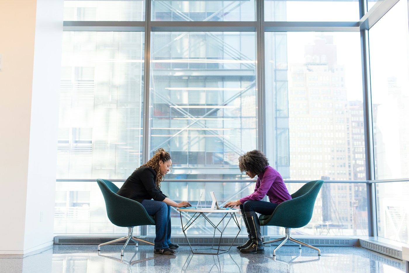 Colleagues working together during a one-to-one session