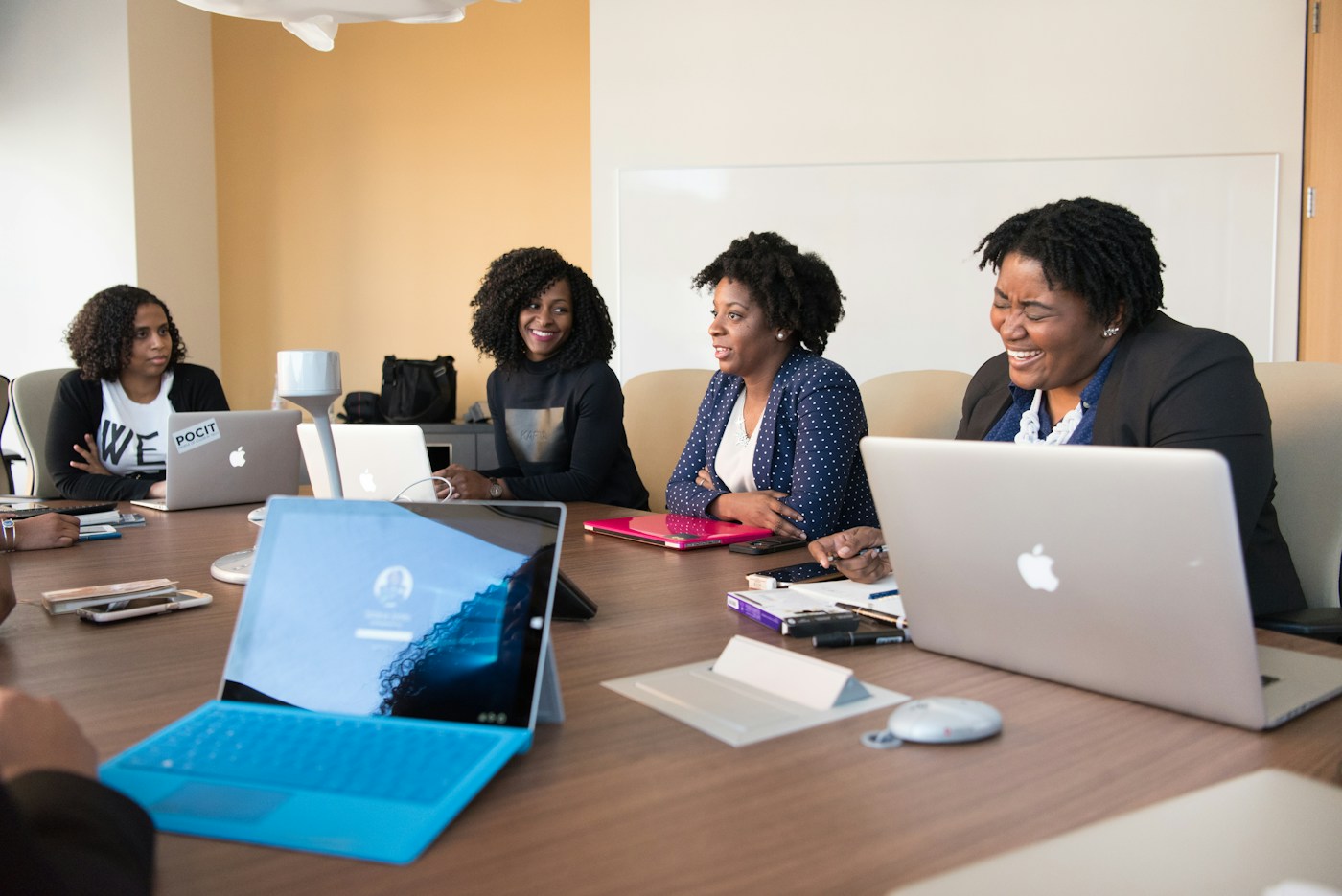 Colleagues discussing ideas in a collaborative meeting